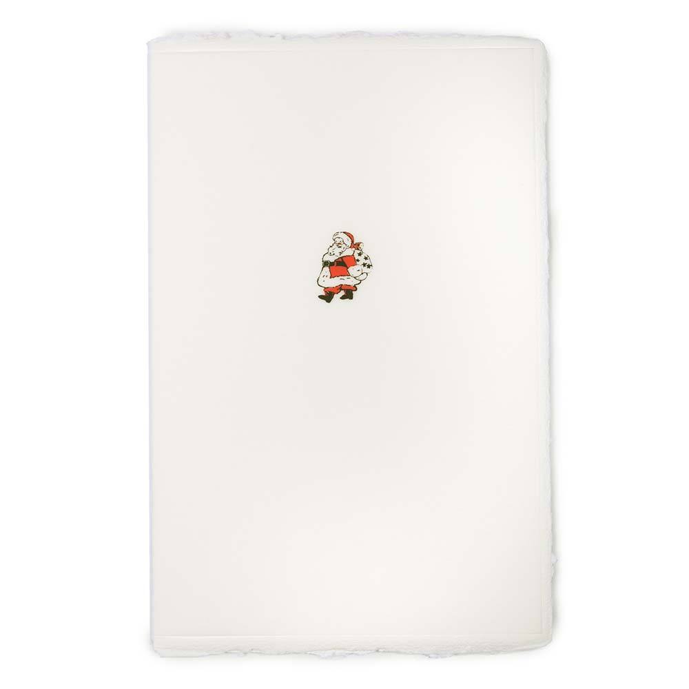 A cream-colored Christmas card with deckled edges, featuring a small illustration of Santa Claus in a red suit holding a sack of gifts.
