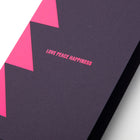 A close-up of a sleek dark card with neon pink triangle accents and the words LOVE PEACE HAPPINESS in the center.