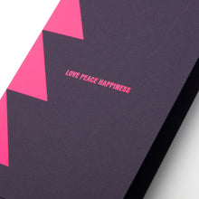 A close-up of a sleek dark card with neon pink triangle accents and the words LOVE PEACE HAPPINESS in the center.