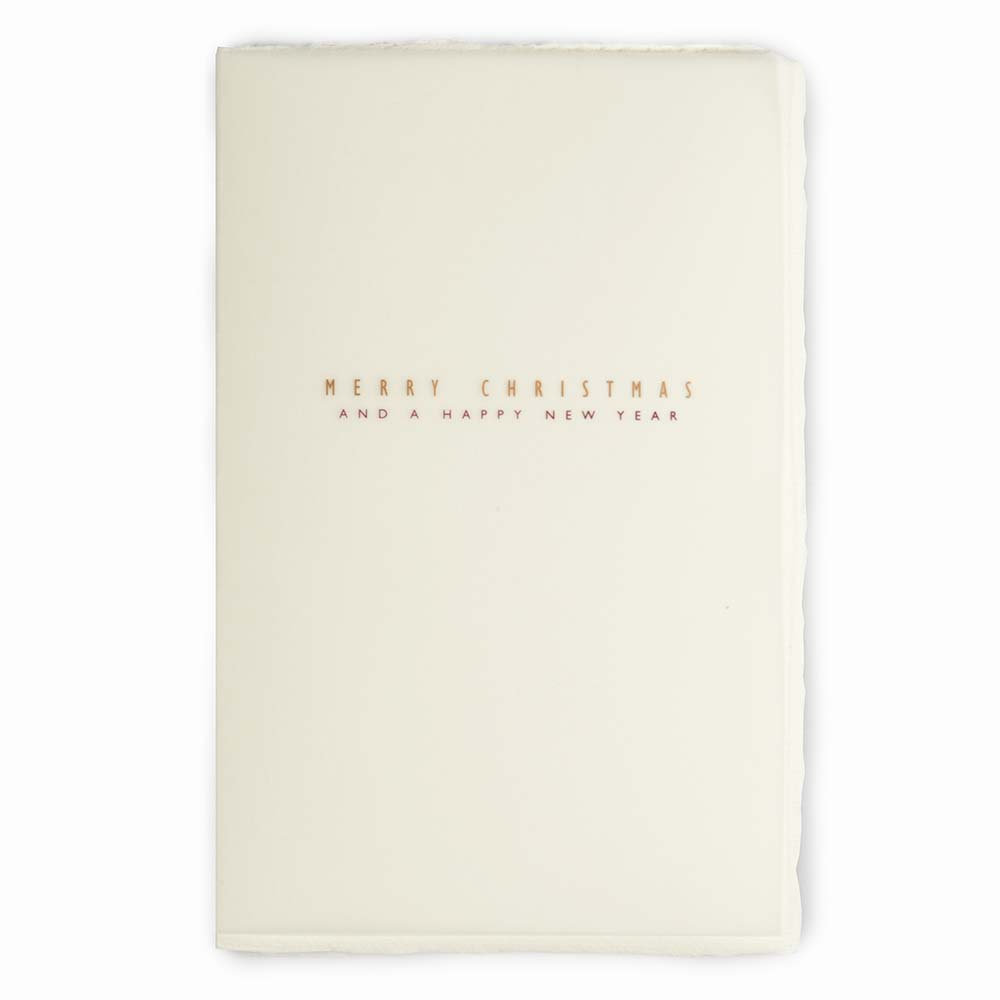 Minimalist Christmas card made from textured cream deckle-edged paper, featuring delicate gold lettering that reads “Merry Christmas and Happy New Year".