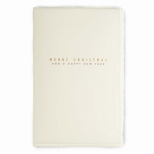 Minimalist Christmas card made from textured cream deckle-edged paper, featuring delicate gold lettering that reads “Merry Christmas and Happy New Year".