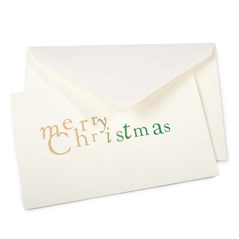 Elegant cream Christmas card featuring the phrase 'merry Christmas' in playful gold and green lettering, accompanied by a matching envelope.