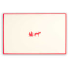 Cream-colored Christmas card with red border, showing a red silhouette of Santa in a sleigh pulled by one reindeer.
