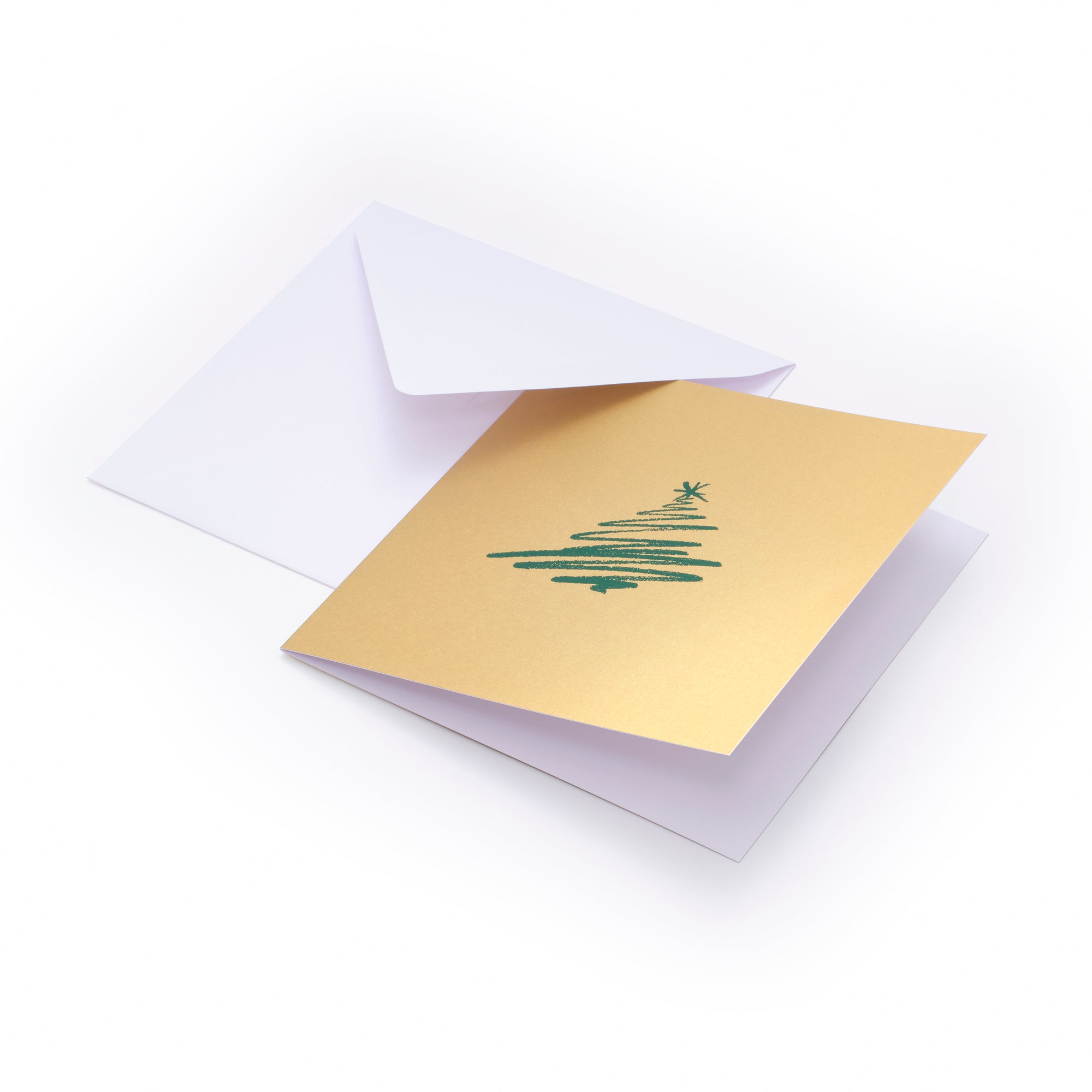 Gold Christmas card with a hand-drawn green Christmas tree illustration in the center, paired with a plain white envelope.