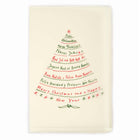 A cream-colored Christmas card with deckled edges, featuring festive greetings in multiple languages written in red and green text arranged in the shape of a Christmas tree.