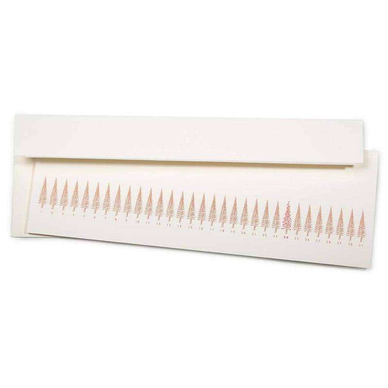 Long, slim Christmas card with a row of stylized gold Christmas trees, numbered like a calendar up to 31. The tree on the 24th is highlighted in red. Comes with a white envelope.
